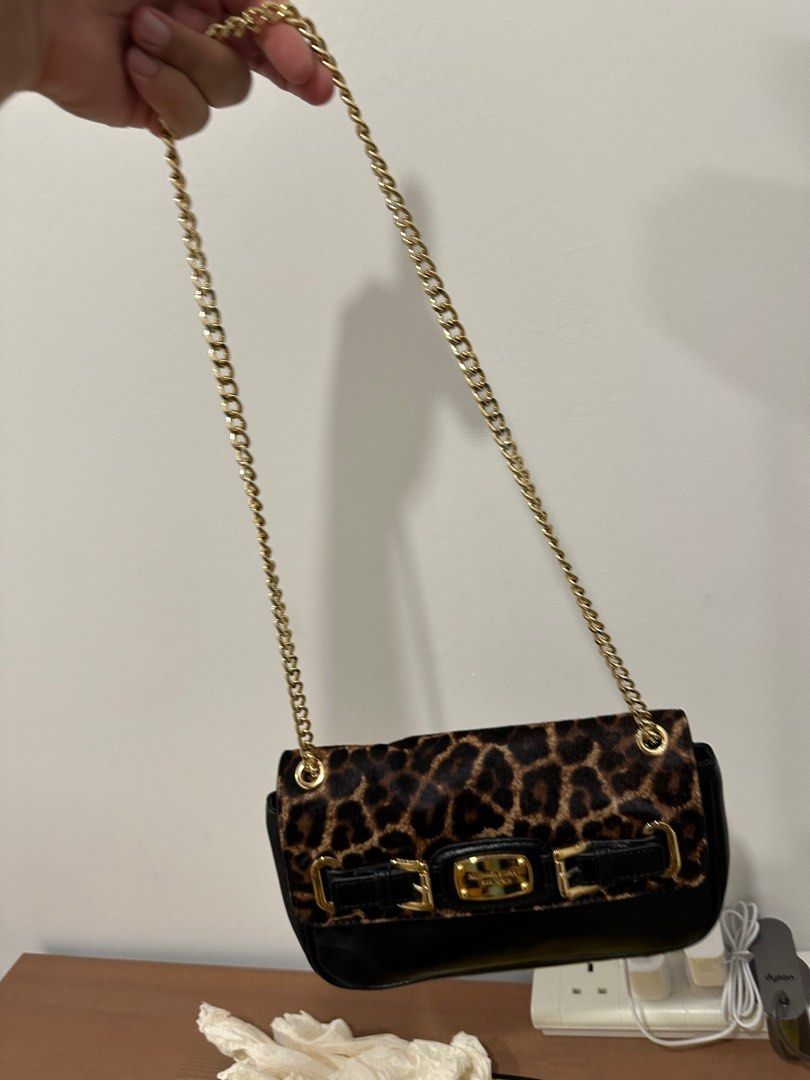 Michael Kors Leopard purse, Women's Fashion, Bags & Wallets, Purses &  Pouches on Carousell