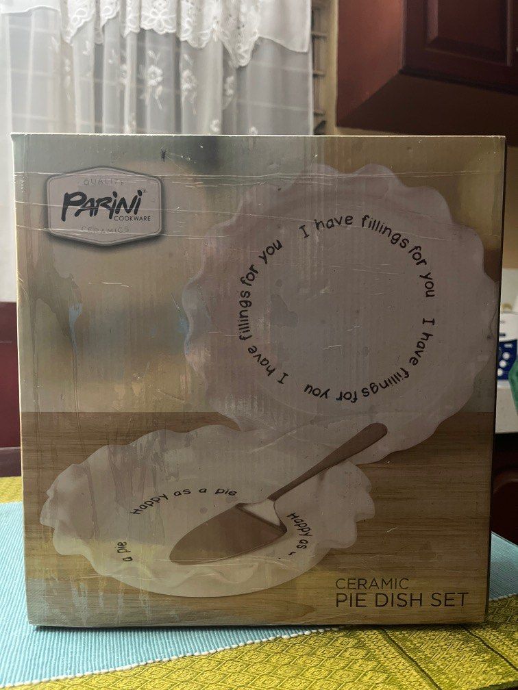 Parini Cookware Ceramic Pie Dish Set (Category: Bakeware) located in Quezon City. Submitted by rebekkapacs29 (Listing ID 1260222314, Image 1). Description: from the USA authentic and brand new Parini Cookware White ceramic pie dish set.