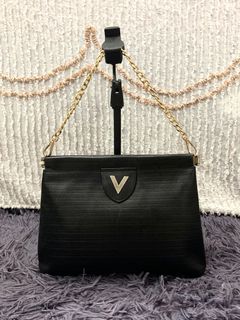 Valentino clutch price 2025