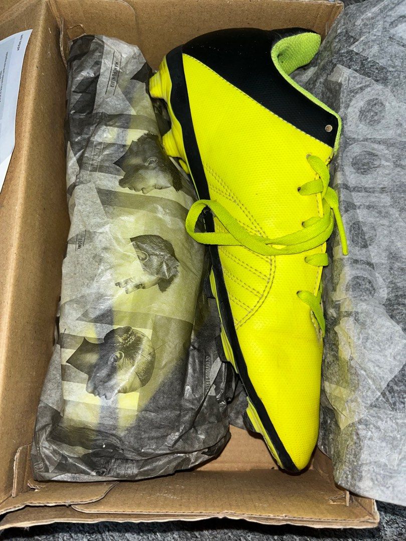 Neon yellow football top cleats