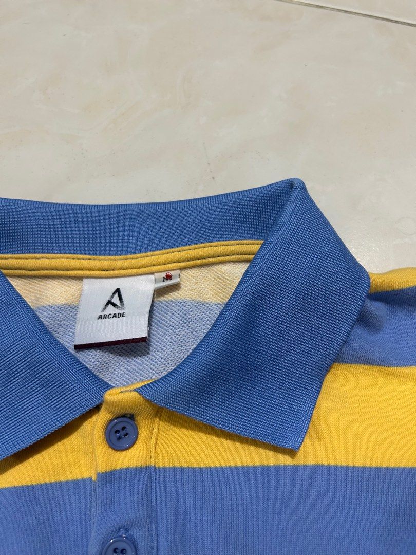 navy and yellow t shirt