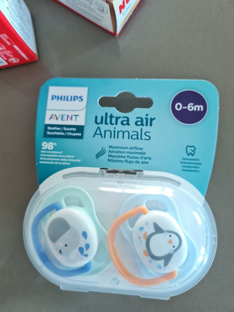 Avent + Nuk (Category: Soothers & Pacifiers) located in Paranaque City. Submitted by excess_must_go (Listing ID 1260474374, Image 1). Description: new avent nuk pink and blue unused nuk white and green just tried once.