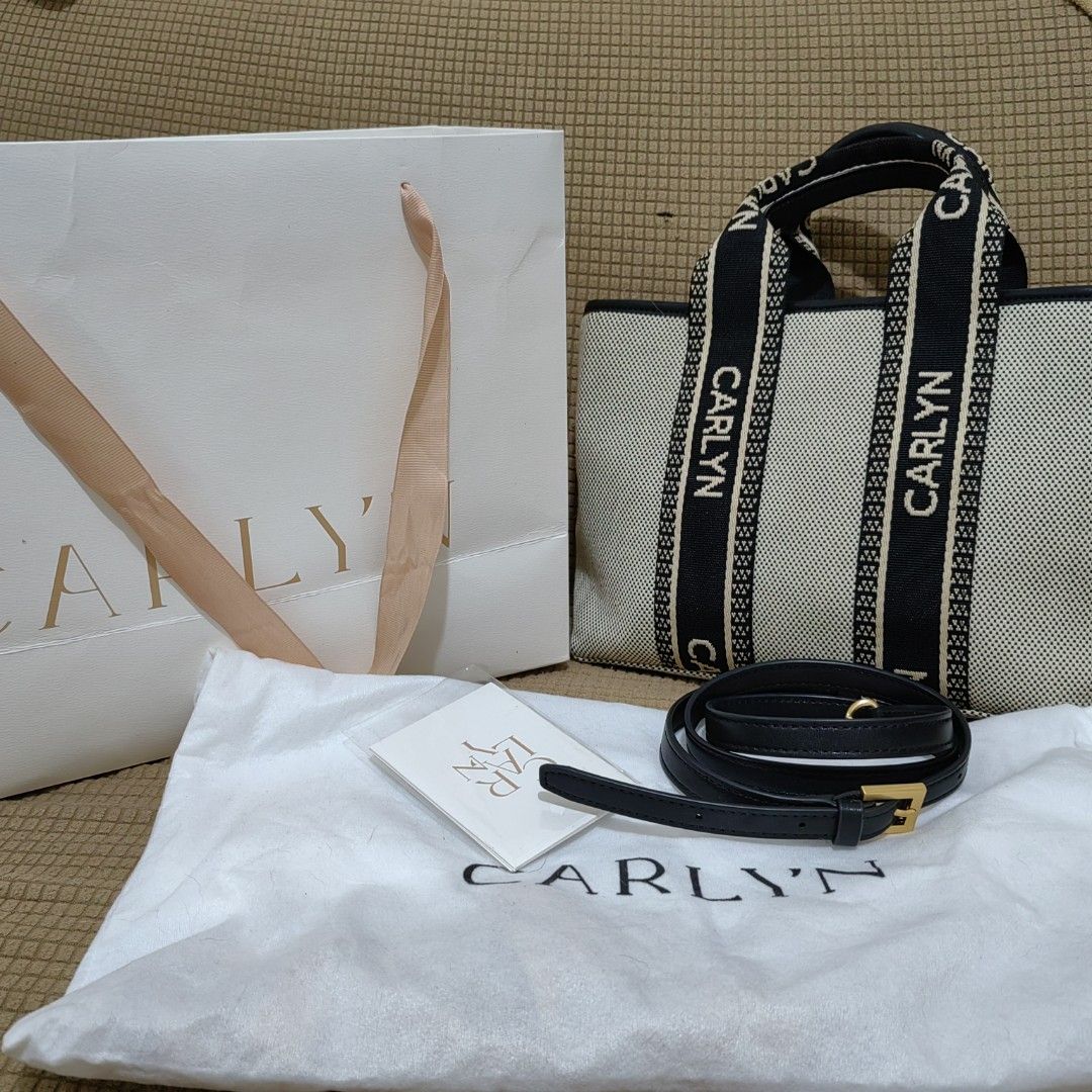 Carlyn Book Tote (Category: Luxury Bags & Wallets) located in San Jose. Submitted by finelovedbygrace (Listing ID 1260469626, Image 1). Description: ✨✨Carlyn Book Tote ✨✨ 📢Canvass Material 🧺Complete Inclusion: (Paper Bag, Dust Bag, Care Card) 💘1-2 times lang nagamit ❌NO ISSUE. SUPER PERFECT CONDITION ✅ Guaranteed Authentic 💰3000 NA LANG ✅Slightly Negotiable.