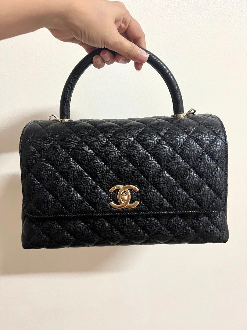 Chanel coco handle in black with champagne hardware (Category: Luxury Bags & Wallets) located in Makati City. Submitted by samfaves (Listing ID 1260427593, Image 1). Description: Pre loved Chanel coco handle in medium microchipped Bought end of last year Like new Completes with box , dustbag, receipt, paper bag. .