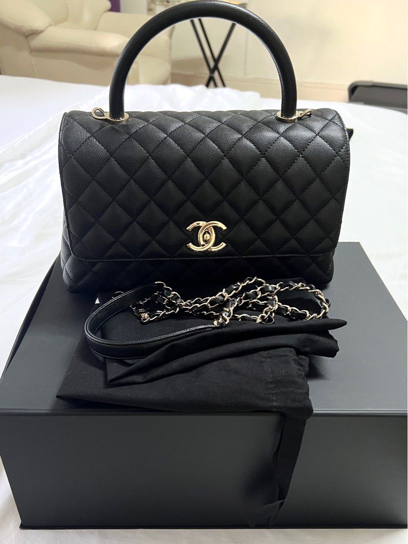 Chanel coco handle in black with champagne hardware (Category: Luxury Bags & Wallets) located in Makati City. Submitted by samfaves (Listing ID 1260427593, Image 3). Description: Pre loved Chanel coco handle in medium microchipped Bought end of last year Like new Completes with box , dustbag, receipt, paper bag. .