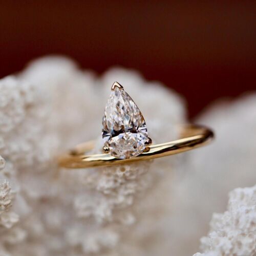 Custom solitaire engagement clearance rings