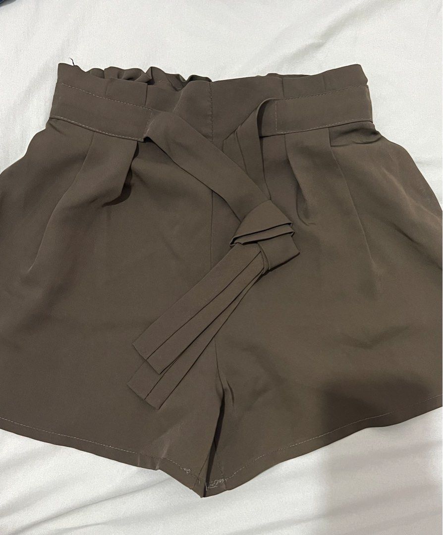 green silk shorts (Category: Shorts) located in Pasig City. Submitted by _heysissy (Listing ID 1260472657, Image 1). Description: xs-medium.
