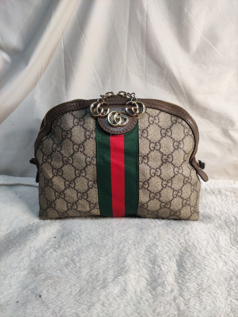 Small gucci best sale clutch bag