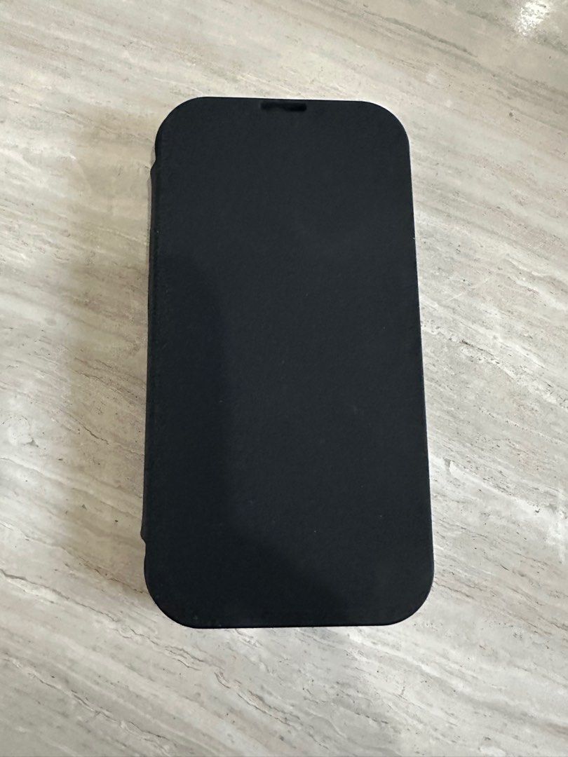Iphone 14 Pro phone case magsafe (Category: Cases & Sleeves) located in Muntinlupa City. Submitted by onemanila (Listing ID 1260385268, Image 2). Description: Bought and used for 3 days. Not used to having phone cover with flap. Orig price P2,095. Magsafe. With one card slot inside. Purchased at The Loop in SM MAKATI. I still have receipt. .