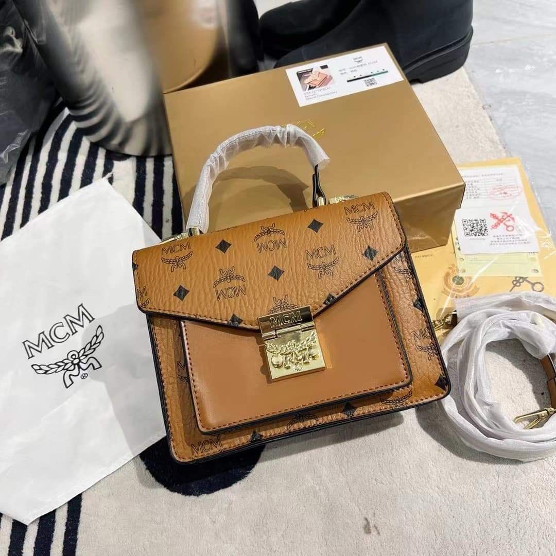 Mcm cognac doctors bag, Luxury, Bags & Wallets on Carousell