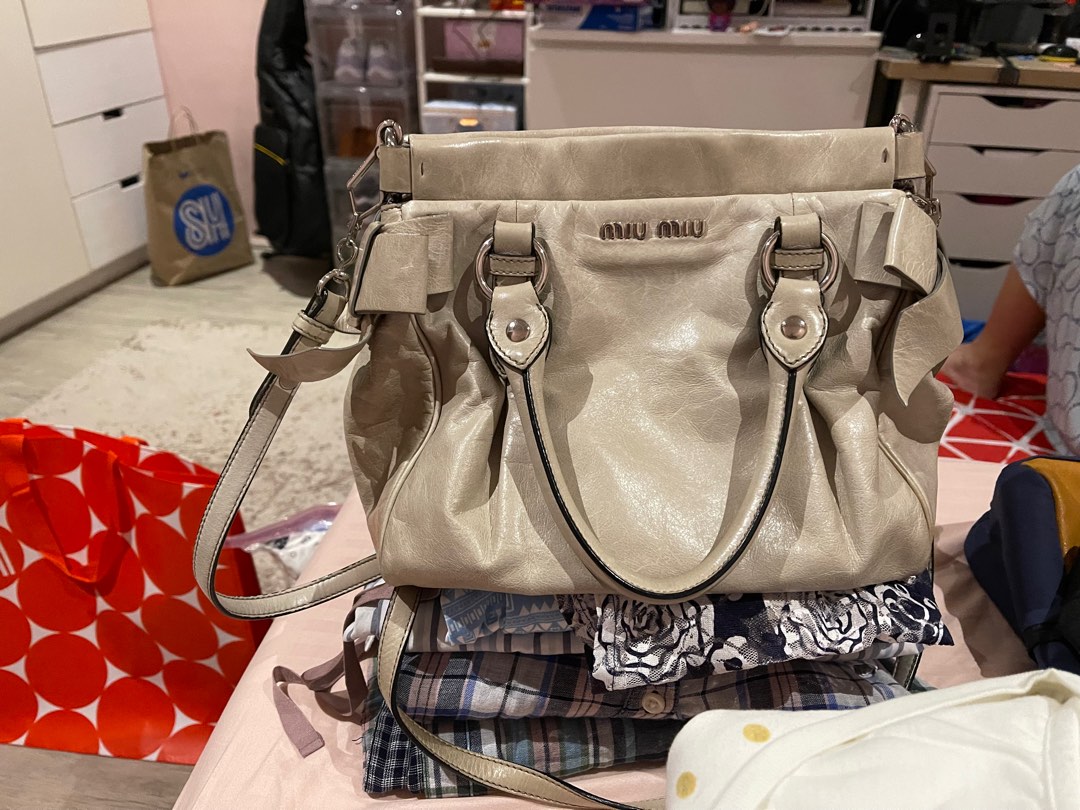Miu miu crossbody bag, Luxury, Bags & Wallets on Carousell