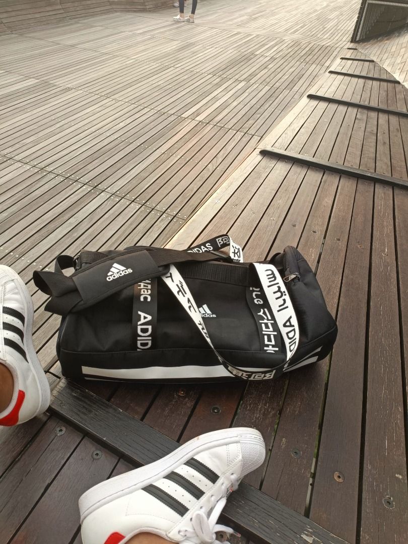 New authentic Adidas 4ATHLTS DUFFEL DUFFLE Sling bag. shoes compartment. 7 language design. Can use as a backpack
