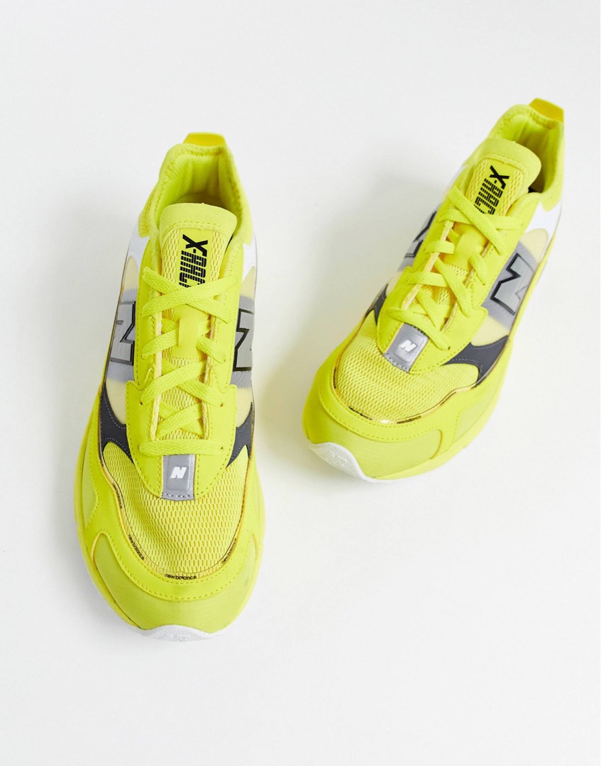 Yellow new balance x racer top