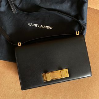 Leather clutch bag Yves Saint Laurent Red in Leather - 14423954