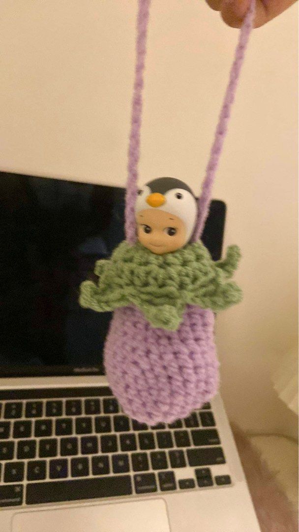 Sonny Angel Eggplant Pouch Bag Charm (Category: Designer & Blind Box Toys) located in Manila. Submitted by polly.studios (Listing ID 1260458479, Image 2). Description: check bio for SHOPEE LINK Guaranteed it won’t fall off your bag given the super secured stem around your sonny angel’s neck ;)) Tried and tested💕 .