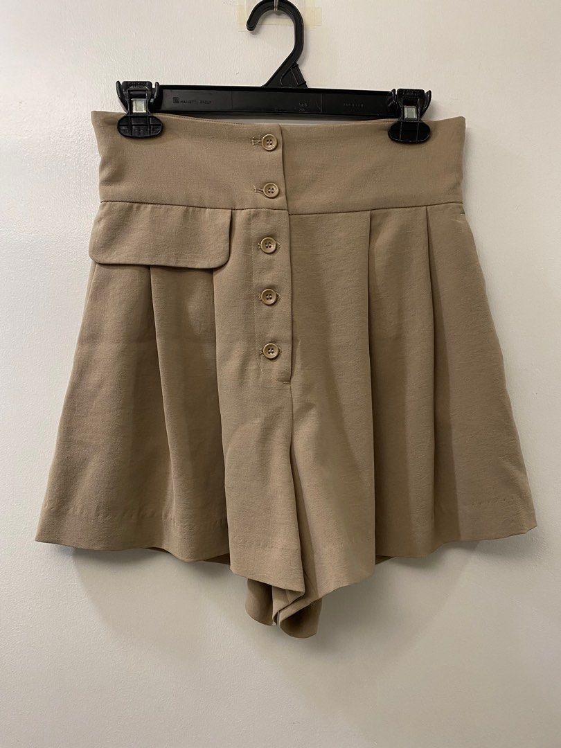 Taupe High Waist Shorts (Category: Shorts) located in Cainta. Submitted by imsojelly (Listing ID 1260459886, Image 1). Description: Faux front and back pockets. Working size pockets. Buttons match the fabric color. Waistline size when laid flat is 14 inches..