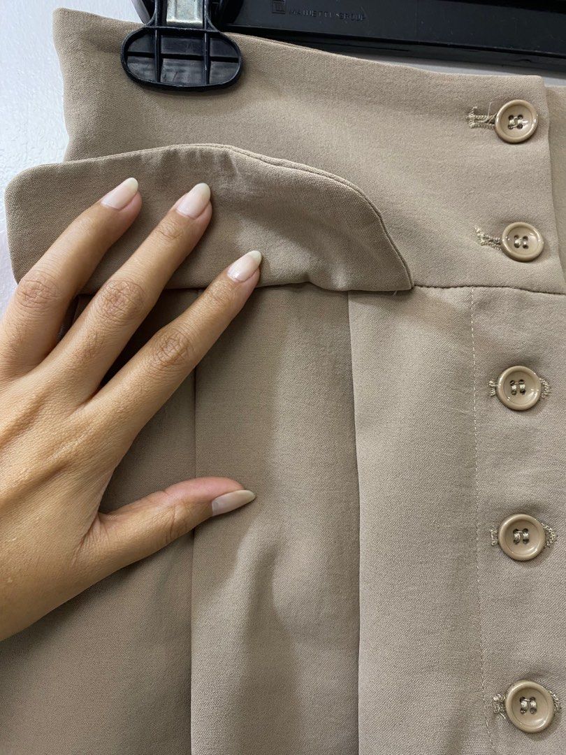 Taupe High Waist Shorts (Category: Shorts) located in Cainta. Submitted by imsojelly (Listing ID 1260459886, Image 2). Description: Faux front and back pockets. Working size pockets. Buttons match the fabric color. Waistline size when laid flat is 14 inches..