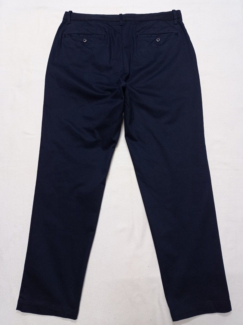 Uniqlo men smart ankle pant (ultra stretch) navy blue, Women's Fashion,  Bottoms, Other Bottoms on Carousell