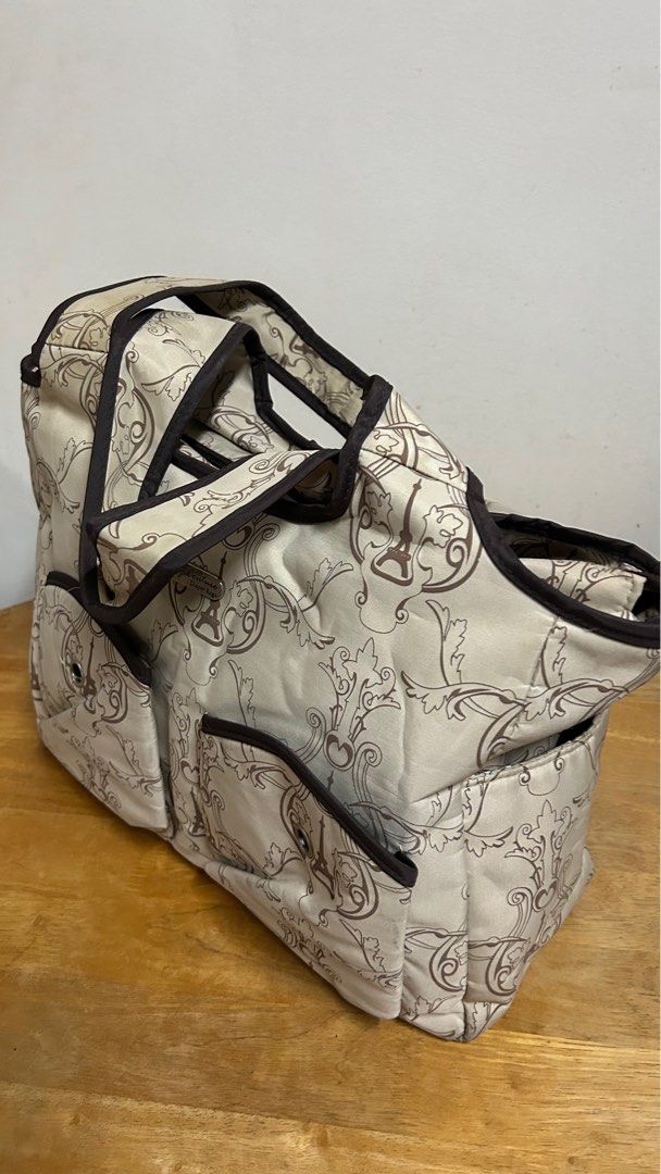 Baby Couture shoulder bag (Category: Shoulder Bags) located in Makati City. Submitted by acebunni (Listing ID 1260559419, Image 3). Description: PLEASE READ DESCRIPTION AND CHECK ALL PHOTOS FIRST ————— Baby Couture diaper bag / shoulder bag ₱800 + sf - well used - slight flaws on base from usage (see photo) - zippers are okay - very spacious bag for variety of purpose and usage (17” inch laptop for reference, laptop nor for sale), with zippers an