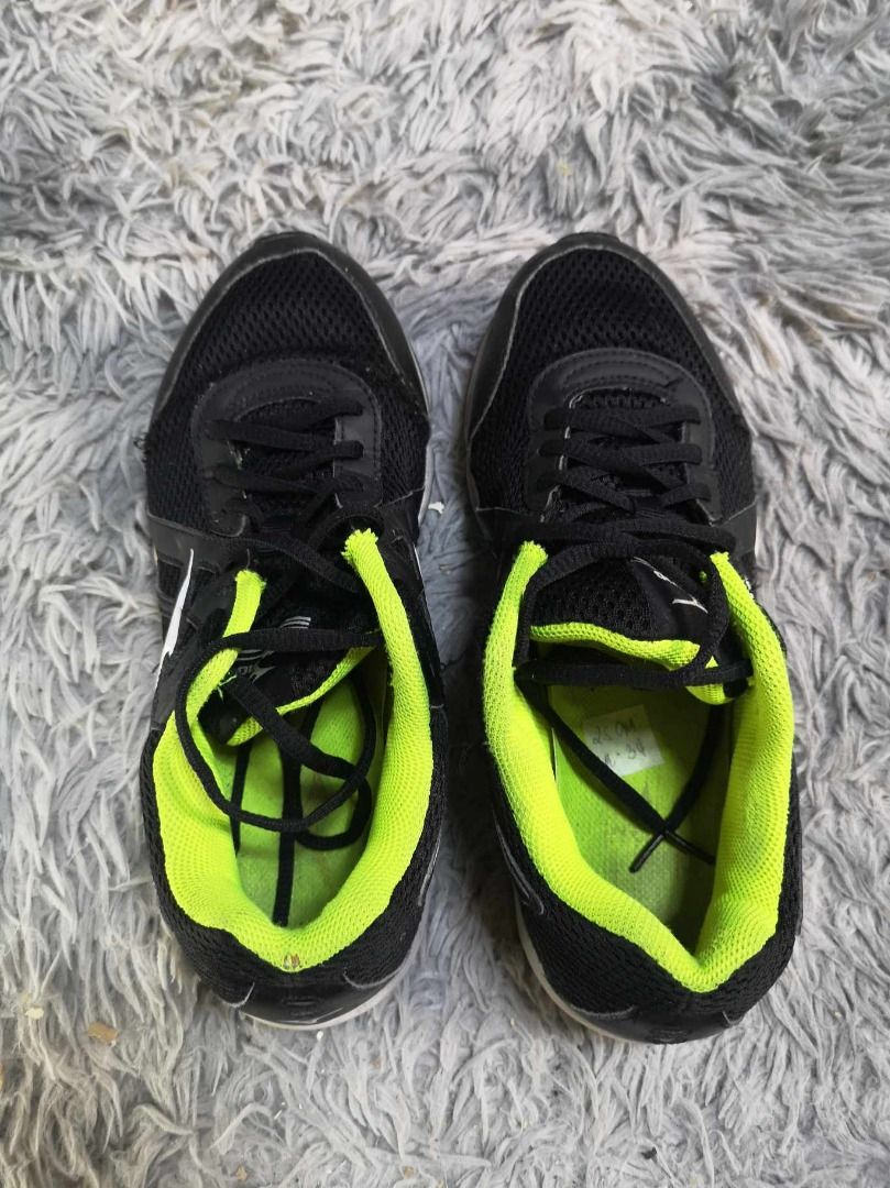 Black and neon green shoes store