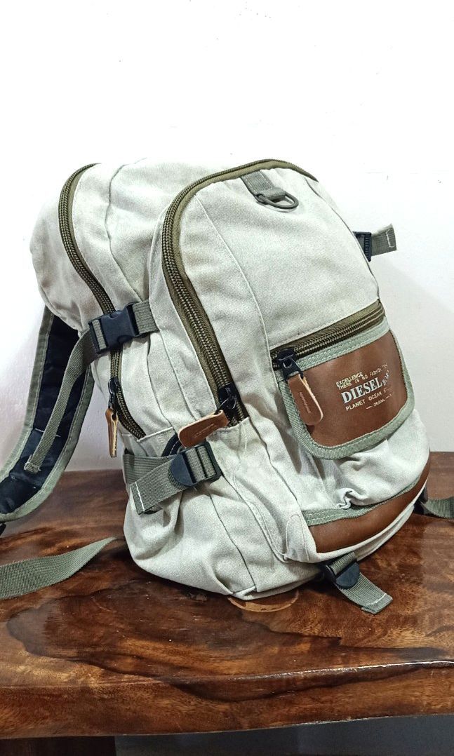 Diesel backpack (Pre-owned) (Category: Backpacks) located in Baguio. Submitted by kayekathh (Listing ID 1260333606, Image 2). Description: Diesel backpack (Pre-owned) with 2 side pockets 2 back pockets 1 inner small pocket 2 side supports 2 base supports.
