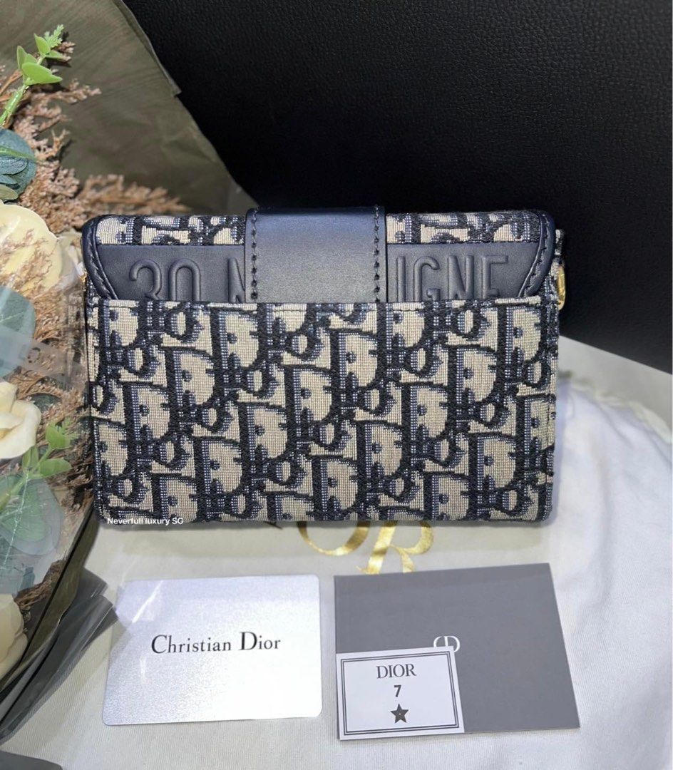 30 montaigne jacquard canvas clutch bag sales