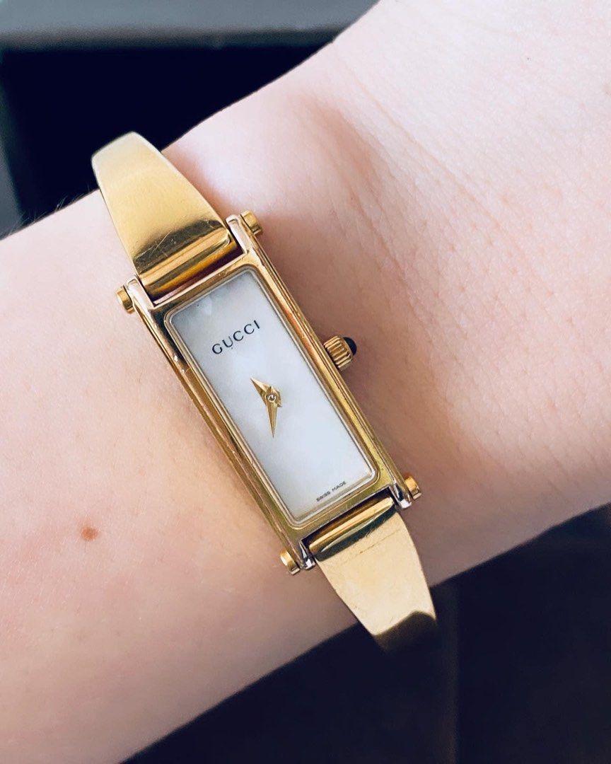 Gucci gold bangle watches ladies on sale