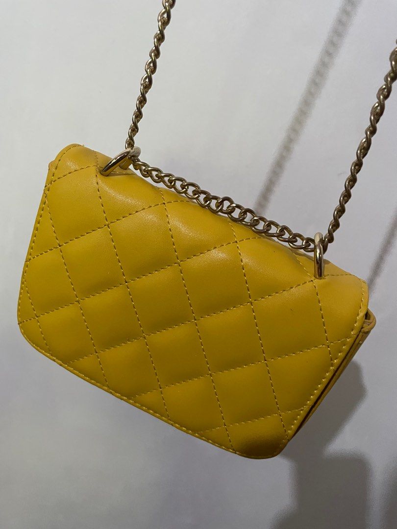 Mini Sling Shoulder Bag Chain (Category: Cross-body Bags) located in Gumaca. Submitted by manraya (Listing ID 1260485233, Image 3). Description: Korean style bag Color: Mustard Yellow .