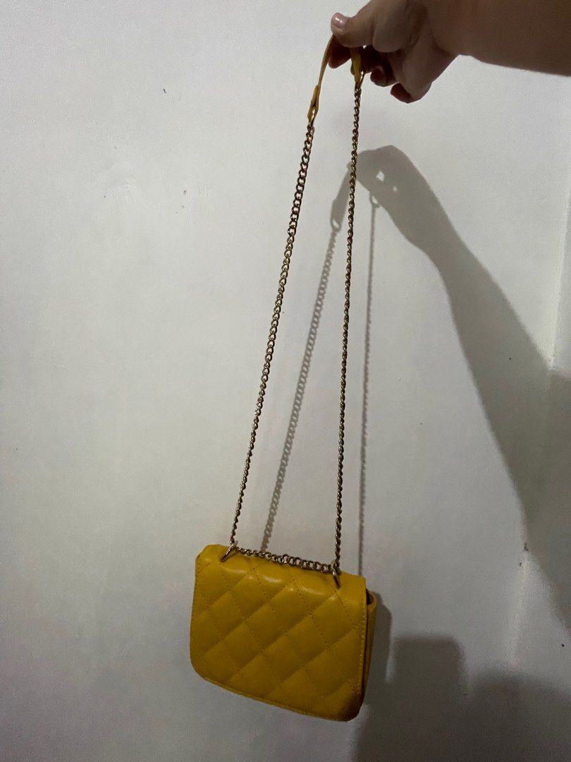 Mini Sling Shoulder Bag Chain (Category: Cross-body Bags) located in Gumaca. Submitted by manraya (Listing ID 1260485233, Image 2). Description: Korean style bag Color: Mustard Yellow .