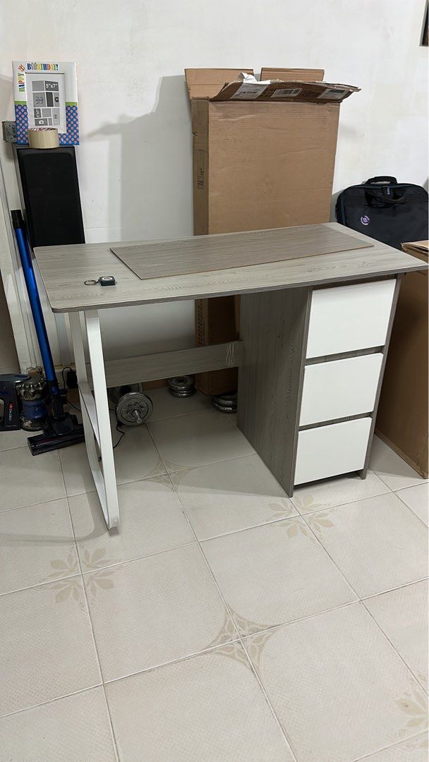 Study Table (Category: Tables & Sets) located in Singapore. Submitted by zoooooj (Listing ID 1260632315, Image 1). Description: Brand new. Already installed but found out is too small to fit my chair. Price can Nego *self collect.