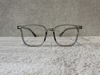 Translucent grey squarish prescription eyewear