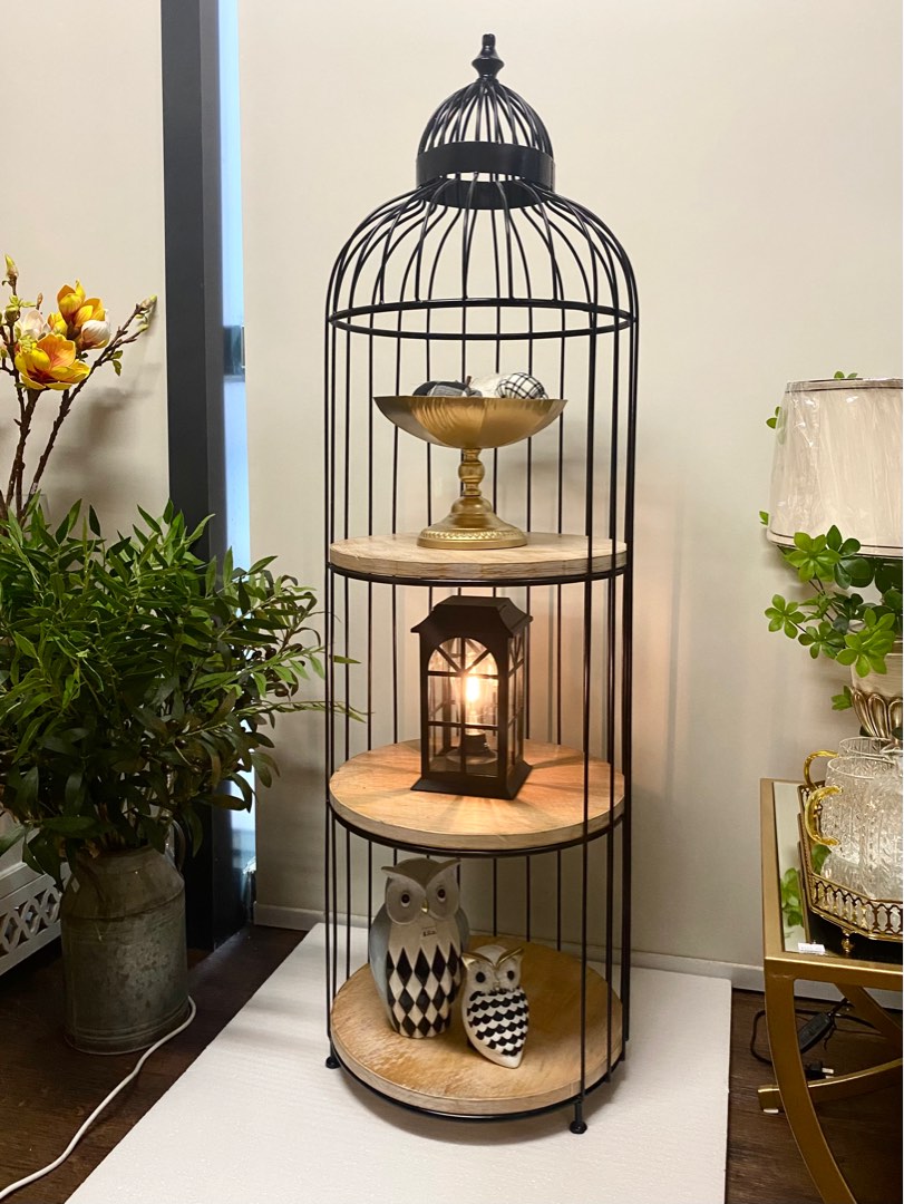 Bird cage shelf clearance