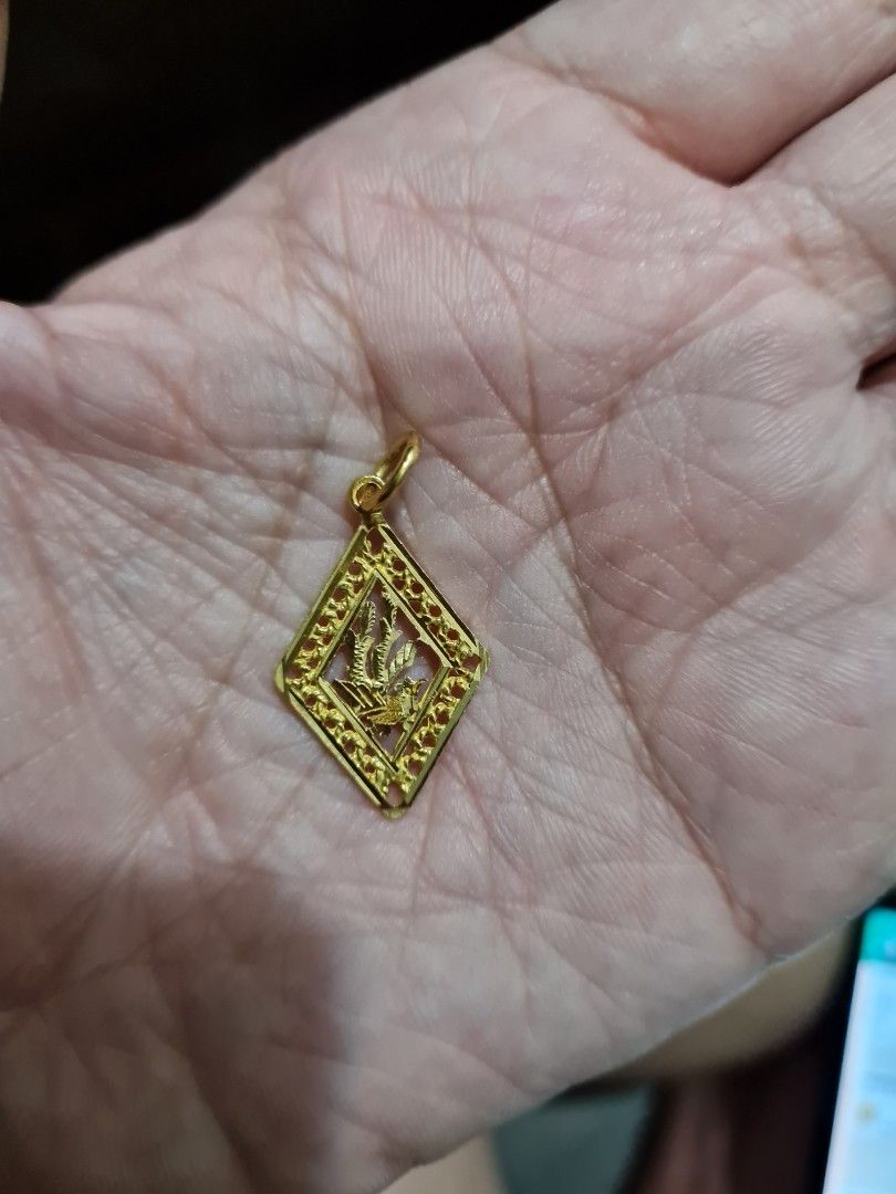Gold phoenix pendant on sale