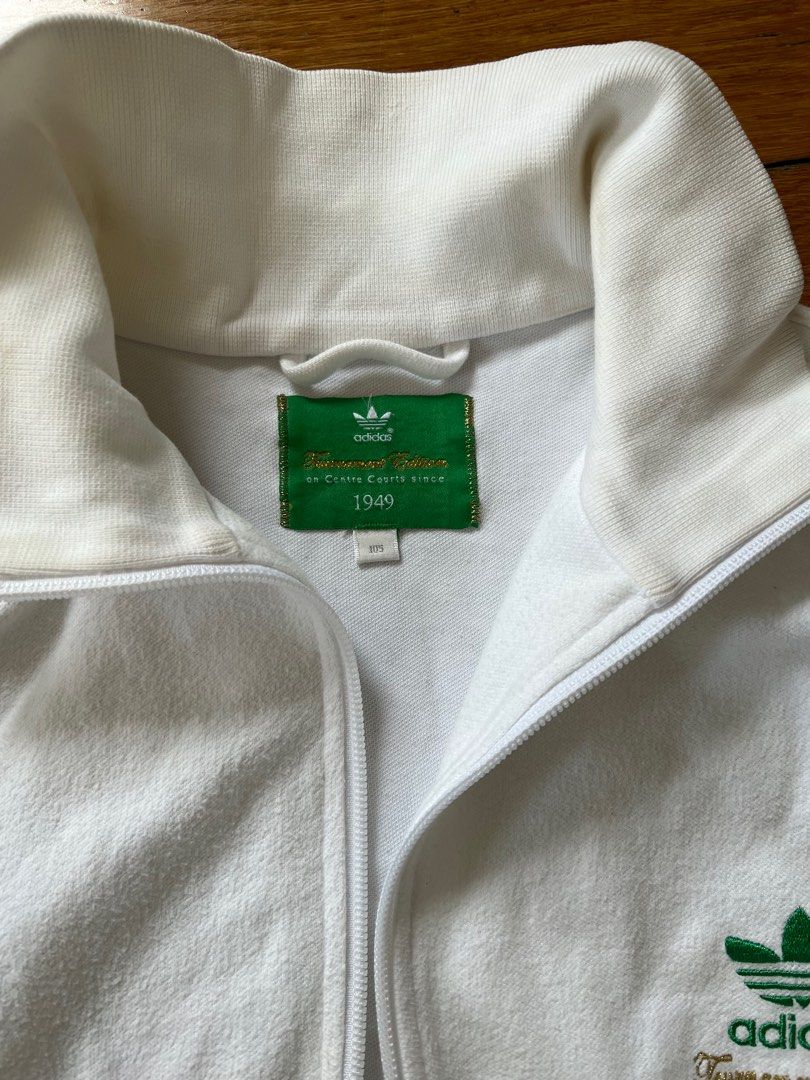 AUTHENTIC TOURNAMENT EDITION WHITE ADIDAS TRACK JACKET ZIP UP (Category: Activewear) located in Manila. Submitted by staceybehag (Listing ID 1260678757, Image 3). Description: Authentic adidas jacket best fits medium man or large woman. The cloth is a bit cotton/ terry cloth ish. .