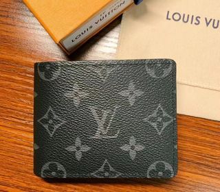 LOUIS VUITTON Monogrammed canvas wallet Size : …