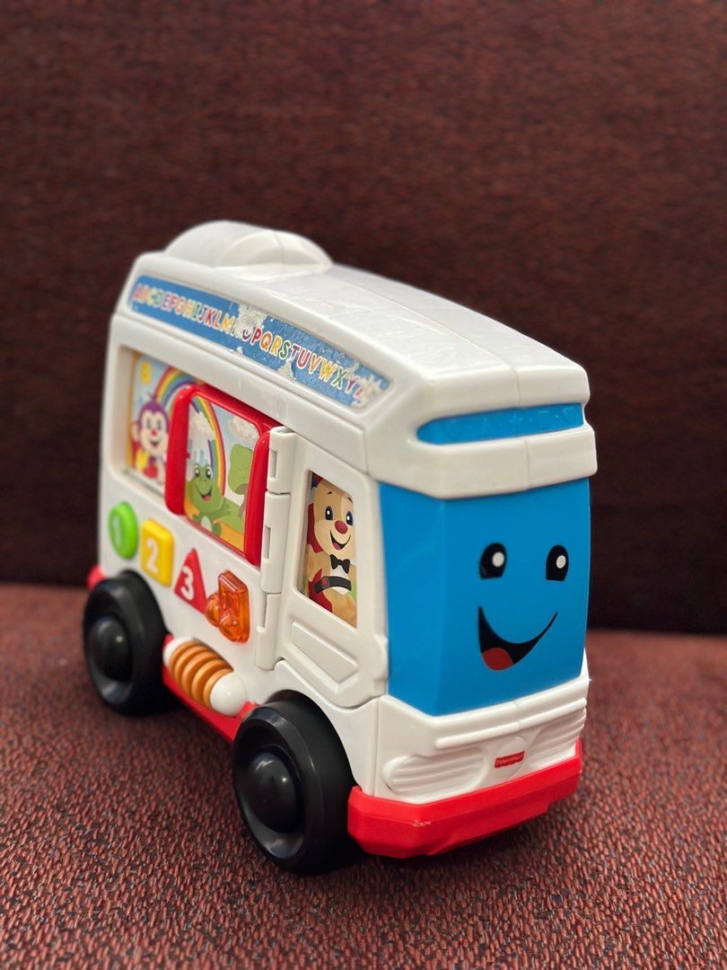 Fisher price laugh and learn around town bus top