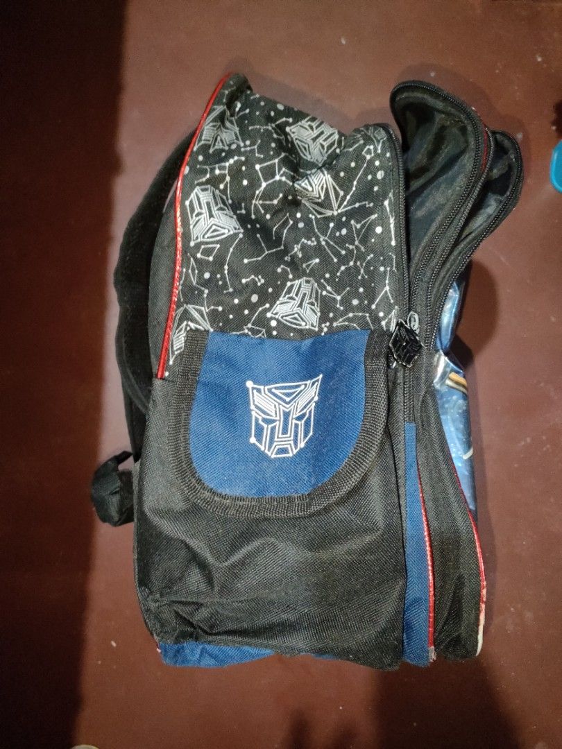 For Sale Preloved Transformers The Last Knight Backpack (Category: Backpacks) located in Pasay City. Submitted by kaygo5 (Listing ID 1260669182, Image 3). Description: For Sale Preloved Transformers The Last Knight Backpack Price: 300 pesos Location: Pasay City See the measurements on the last photo. Flaws, see the last photos. Bawal sa maselan..