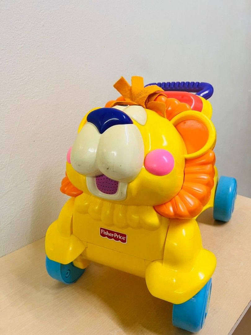 Fisher price walk and ride lion clearance