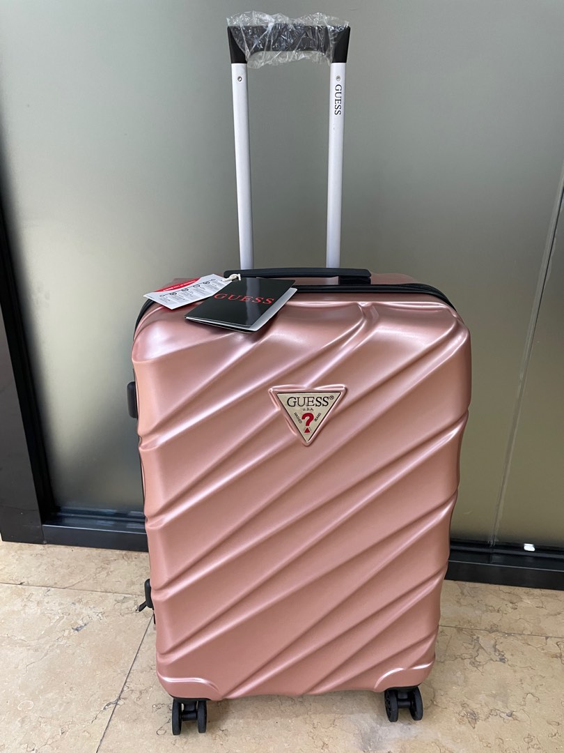 Guess rose gold 26 inch luggage