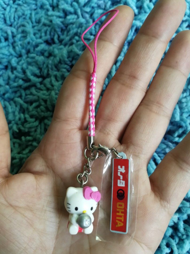 HELLO KITTY Holding Ball Phone Charms (Category: Character Goods) located in Mabalacat. Submitted by whowannashoppe (Listing ID 1260695365, Image 2). Description: P150. 00 (set) or P80.00 EACH HELLO KITTY Holding Ball Phone Charms ©️SANRIO ✔️ Available in two colors ✔️ With markings ✔️ Preloved but in very good condition. ✔️ Unused.