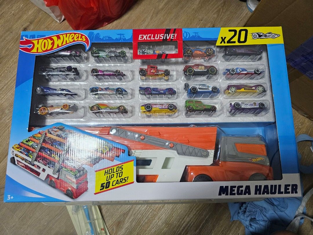 Hot wheels mega shop hauler with 20 vehicles