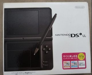 Nintendo DSi LL with games
