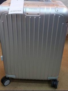 Rimowa Topaz Aluminum Luggage hand carry check in