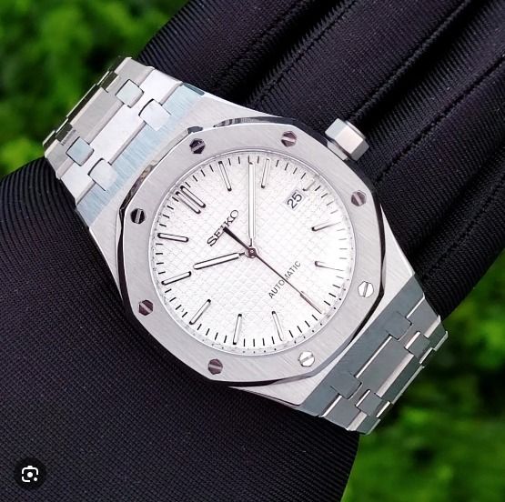 Seiko Royal Oak White (Category: Luxury Watches) located in Quezon City. Submitted by mnl.chll (Listing ID 1260810184, Image 2). Description: ⏱ Watch Specification: • NH35A (TMI) Automatic Movement • Silver Royal Oak Case (42mm) • Flat Sapphire Crystal • Silver Stainless Steel Bezel • White & Silver Ceramic Dial • Silver Royal Oak Hands • Silver Deployment Bracelet (20mm) • Silver Crown Mode of Payment: BANK/GCASH A ₱2,000 down payment (DP) is re