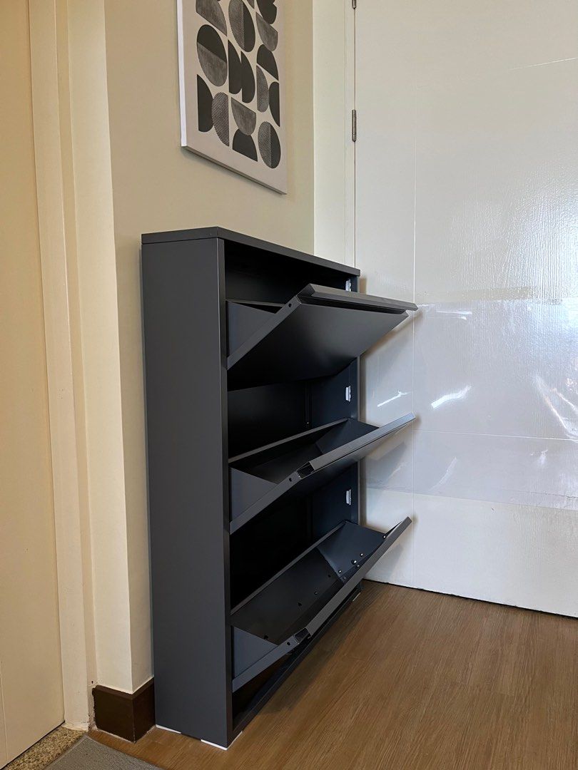 Steel Shoe Rack (Dark Grey) (Category: Storage Boxes & Baskets) located in Pasig City. Submitted by dpl__ (Listing ID 1260712520, Image 2). Description: High Quality Metal Shoe Rack - Dark Grey Material: Pure Steel Powder Coated Paint Rust-proof Can be wall-mounted —— 🛠️ Fully assembled, ready to use —— 📌 Can fit 15-18 pairs depending on your shoe size/type W 18cm L 80cm H 104cm ₱5,500 —— ✅ Super perfect for space saving. We just put it behind 