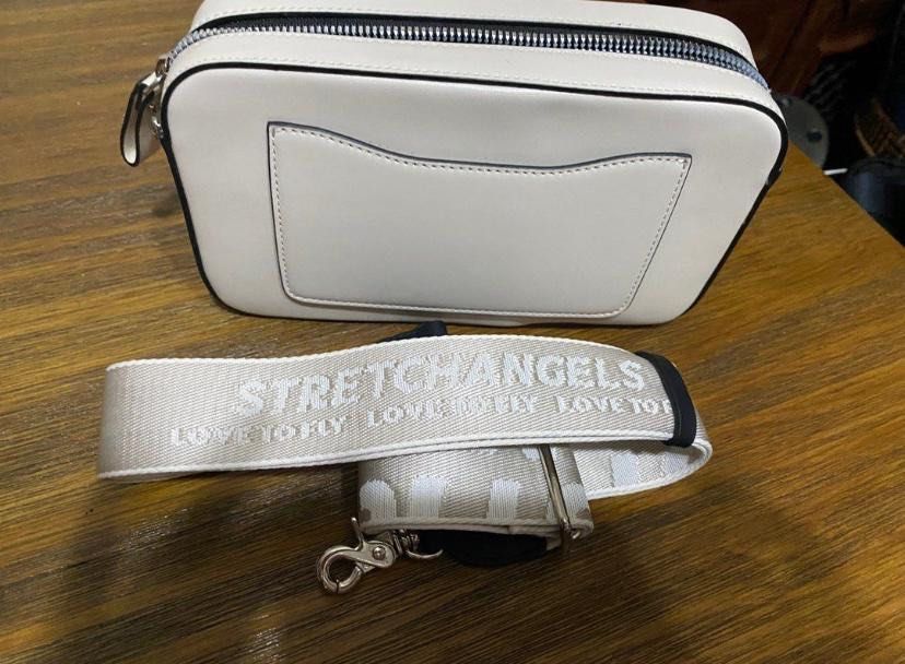 White sling shop bag