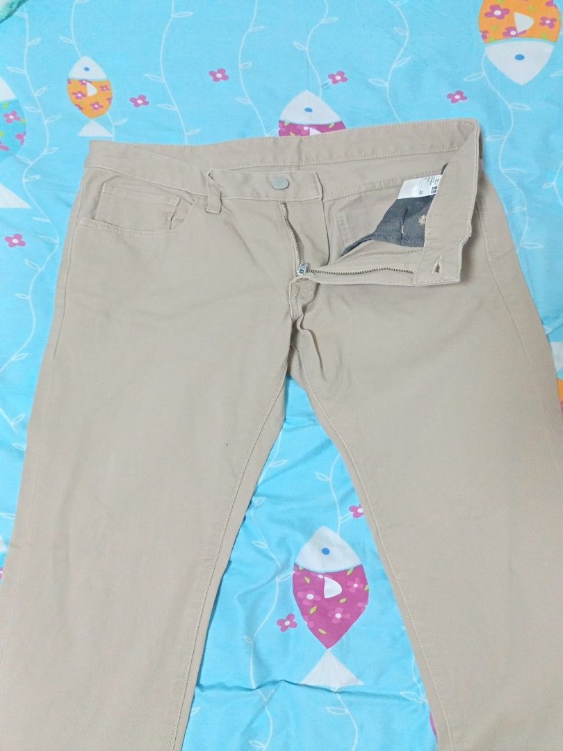 Uniqlo Light Khaki, Men's Fashion, Bottoms, Chinos on Carousell