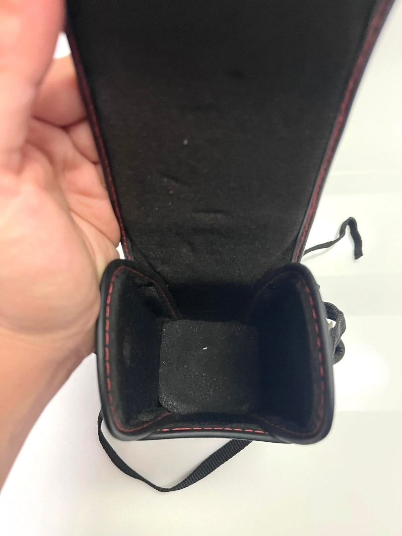 Vintage Sigma NC-50 leather lens case (Category: Camera Bags & Carriers) located in Quezon City. Submitted by sustainable.sarah (Listing ID 1260717953, Image 3). Description: 6.5" height x 3.25" width x 3" length With Removable/Adjustable Straps Black Leather, Snap Closure, Padded Interior. The silver parts are already rusty - this is the only flaw. Great Condition 9/10 Made and bought in Japan back in the 90's. This was my uncle's .
