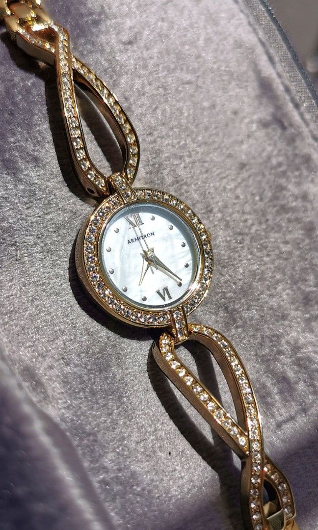 Armitron swarovski discount crystal watch ladies