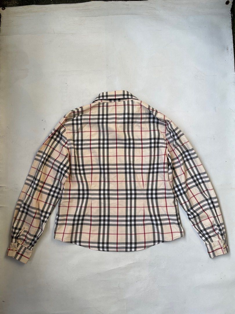 Burberry nova plaid Longsleeve (womens) (Category: Longsleeves) located in Quezon City. Submitted by Prive_Online (Listing ID 1260934720, Image 2). Description: WTS! - Burberry nova plaid Longsleeve (womens) Authentic/Legit Size: Large on tag but fits small Dimensions: L 23 x W W 20 Excellent condition Minor issue: Lost 1 button (Collar area) - 1650 Shipped Firm! No LP‼️ - Loc: Q.c Dm .